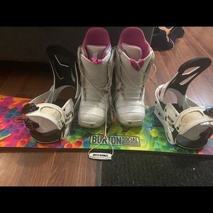 Burton snowboard, bindings and boots. Boots are size 8.5 board is 146